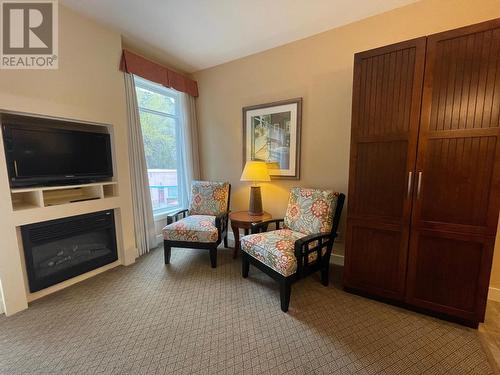 13011 Lakeshore Drive Unit# 234, Summerland, BC - Indoor Photo Showing Living Room With Fireplace