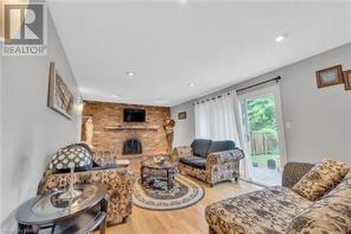 12 Hope Cres, Belleville, ON - Indoor Photo Showing Living Room With Fireplace
