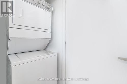 310 - 111 Worsley Street, Barrie, ON - Indoor Photo Showing Laundry Room