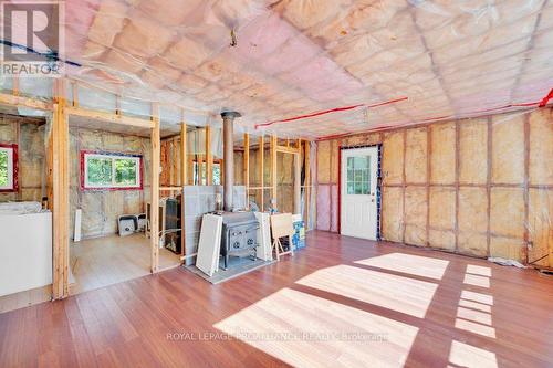 1036 Turner Way, Central Frontenac, ON - Indoor Photo Showing Other Room With Fireplace