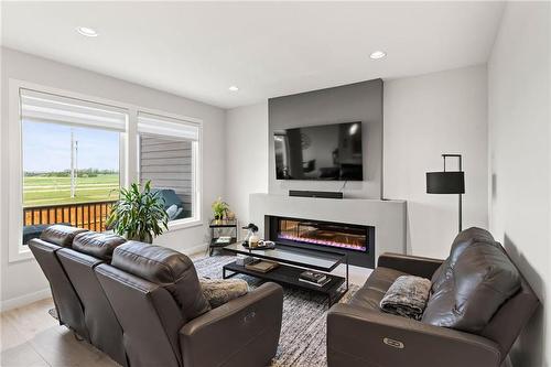 11 Will'S Way, Winnipeg, MB - Indoor Photo Showing Living Room With Fireplace