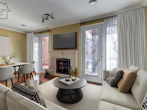 Salon - 201-3000 Boul. Notre-Dame, Laval (Chomedey), QC - Indoor Photo Showing Living Room With Fireplace