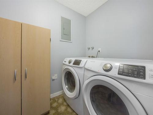 107-983 Bernard Avenue, Kelowna, BC - Indoor Photo Showing Laundry Room
