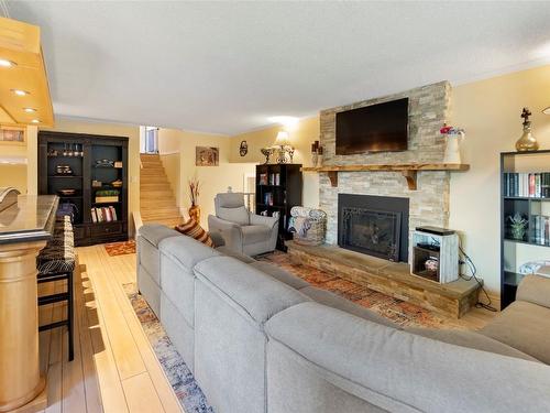 3700 9Th Avenue, Castlegar, BC - Indoor Photo Showing Living Room With Fireplace