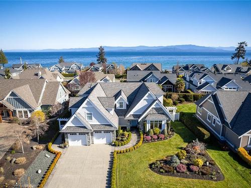 835 Bluffs Dr, Qualicum Beach, BC - Outdoor With Body Of Water With Facade