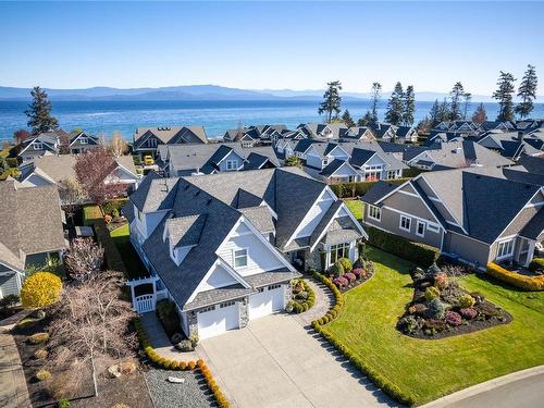 835 Bluffs Dr, Qualicum Beach, BC - Outdoor With Body Of Water With Facade