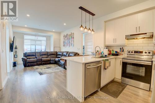 #531 -1105 Leger Way, Milton, ON - Indoor Photo Showing Kitchen With Stainless Steel Kitchen