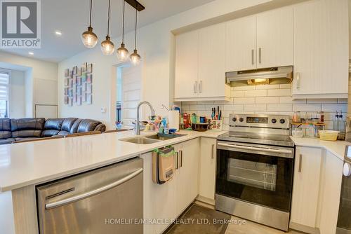 #531 -1105 Leger Way, Milton, ON - Indoor Photo Showing Kitchen With Stainless Steel Kitchen With Double Sink