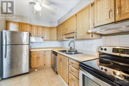 This photo is virtually decluttered and/or - 665 Bathgate Drive Unit#1506, Ottawa, ON - Indoor Photo Showing Kitchen With Double Sink