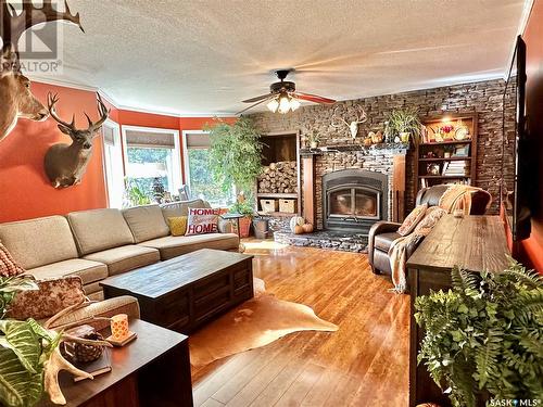 Park Valley Acreage, Canwood Rm No. 494, SK - Indoor Photo Showing Living Room With Fireplace