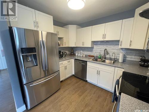 869 6Th Street E, Prince Albert, SK - Indoor Photo Showing Kitchen With Double Sink