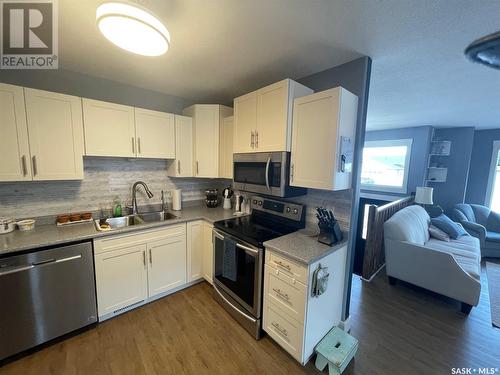 869 6Th Street E, Prince Albert, SK - Indoor Photo Showing Kitchen With Double Sink