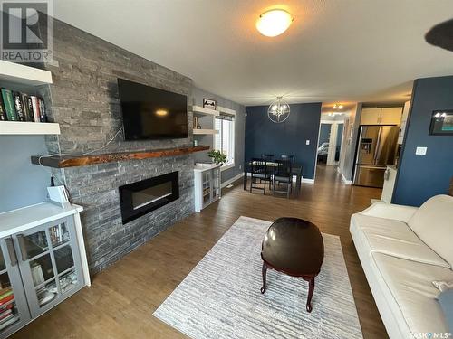 869 6Th Street E, Prince Albert, SK - Indoor Photo Showing Living Room With Fireplace