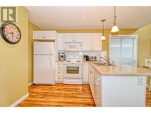 6723 La Palma Loop Unit# 242 Lot# 242, Fintry, BC - Indoor Photo Showing Kitchen With Double Sink