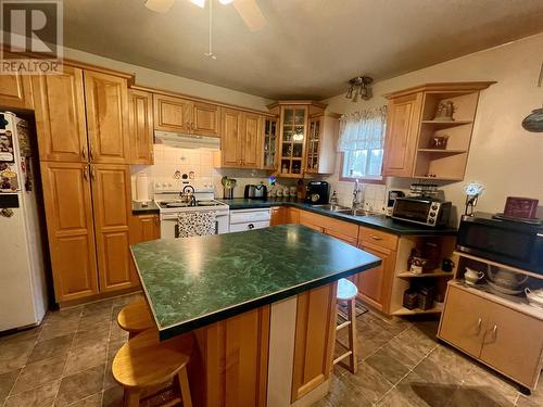 1908 102 Avenue, Dawson Creek, BC - Indoor Photo Showing Kitchen With Double Sink