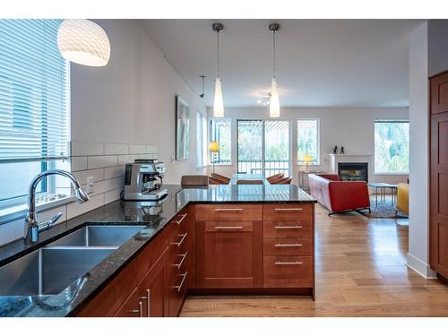 2430 Perrier Lane, Nelson, BC - Indoor Photo Showing Kitchen With Fireplace With Double Sink