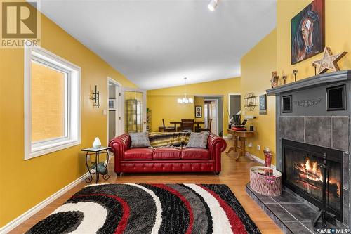 715 Morrier Street, Buckland Rm No. 491, SK - Indoor Photo Showing Living Room With Fireplace