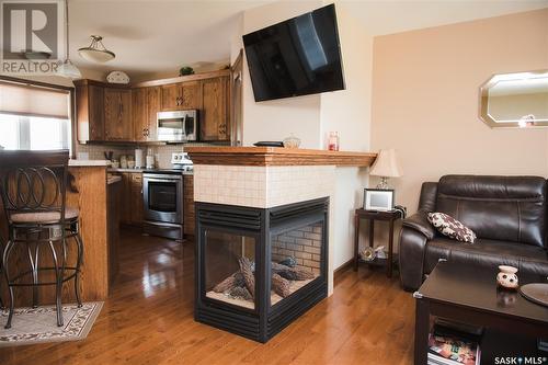 4 Island View, Cymri Rm No. 36, SK - Indoor Photo Showing Living Room With Fireplace