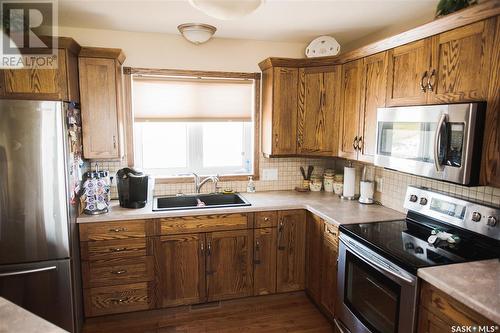 4 Island View, Cymri Rm No. 36, SK - Indoor Photo Showing Kitchen With Double Sink