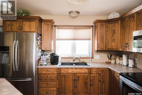 4 Island View, Cymri Rm No. 36, SK - Indoor Photo Showing Kitchen With Double Sink