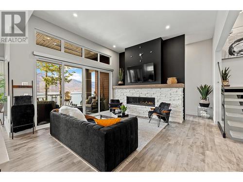 3324 Black Pine Lane, Kelowna, BC - Indoor Photo Showing Living Room With Fireplace
