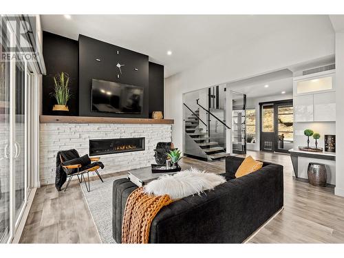 3324 Black Pine Lane, Kelowna, BC - Indoor Photo Showing Living Room With Fireplace