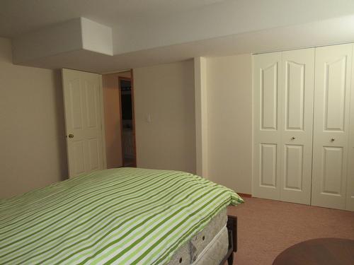 1918 Riverside Crescent, Castlegar, BC - Indoor Photo Showing Bedroom