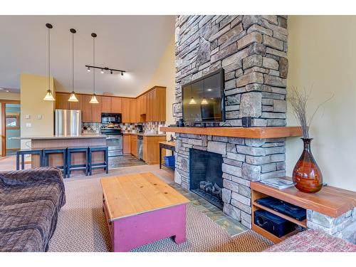 101C - 47 Rivermount Place, Fernie, BC - Indoor With Fireplace