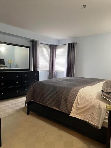 309 835 Adsum Drive, Winnipeg, MB - Indoor Photo Showing Bedroom