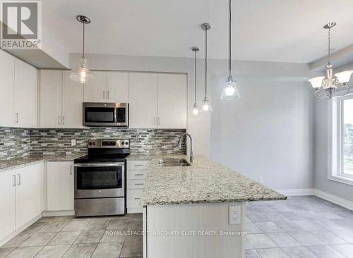 #1 -1050 Elton Way, Whitby, ON - Indoor Photo Showing Kitchen With Upgraded Kitchen