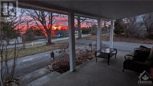Beautiful sunset from the front porch - 171 Gardiner Shore Road, Carleton Place, ON - Outdoor With Deck Patio Veranda