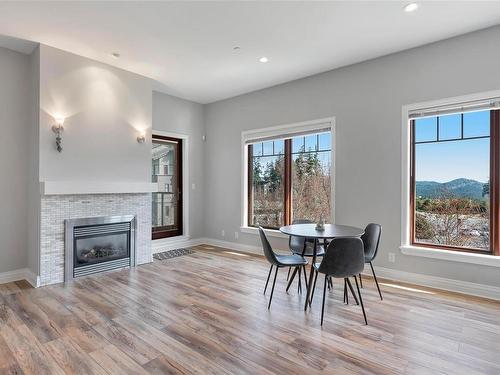 405-1335 Bear Mountain Pkwy, Langford, BC - Indoor With Fireplace