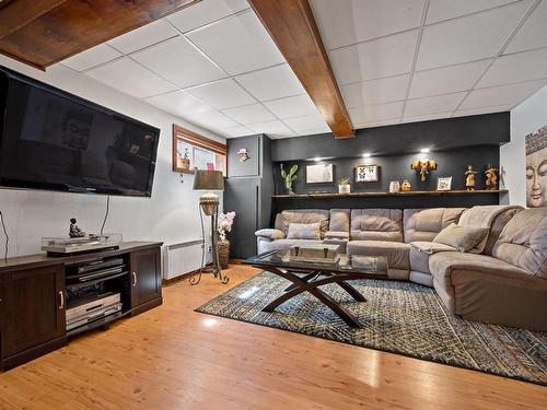 Salle familiale - 391 Ch. Des Fondateurs, Lac-Saguay, QC - Indoor Photo Showing Living Room With Fireplace