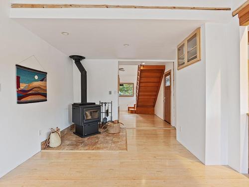 3500 Granite Bay Rd, Quadra Island, BC - Indoor Photo Showing Other Room With Fireplace
