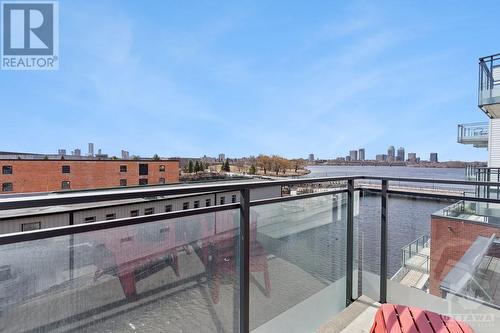 Sunset views upriver are a great way to end your day - 320 Miwate Private Unit#411, Ottawa, ON - Outdoor With Balcony