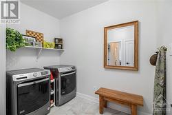 Laundry room with access to the garage. - 