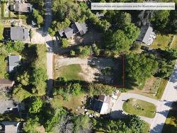 Welcome to 11 Sarnia Ave in Sauble Beach's North end. Cleared lot with gravel driveway installed. Deeded access to Sauble River. - 