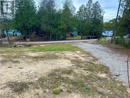 Cleared lot with gravel driveway, looking at Sarnia Ave. Lot 66'x132' - 11 Sarnia Avenue, Sauble Beach, ON 