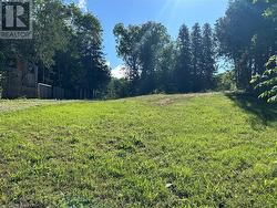 Cleared lot with gravel driveway, looking at Sarnia Ave. Lot 66'x132' - 
