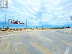 Welcome to Sauble Beach sign. - 