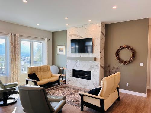 1711 Pine Ridge Mountain Place, Invermere, BC - Indoor Photo Showing Living Room With Fireplace