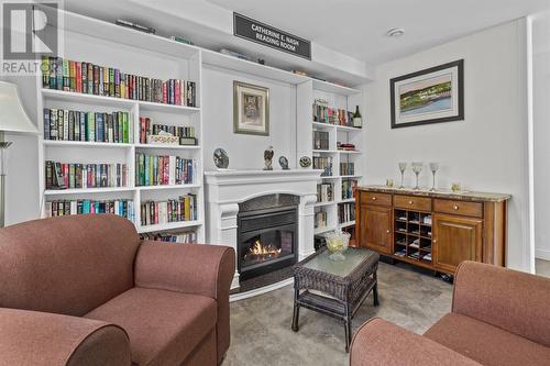 65 Main Road, Branch, NL - Indoor Photo Showing Living Room With Fireplace