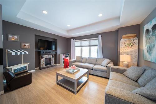 20 Langevin Road, Ste Anne, MB - Indoor Photo Showing Living Room With Fireplace