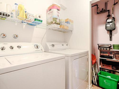 Salle de lavage - 304-5740 Place Trenet, Laval (Auteuil), QC - Indoor Photo Showing Laundry Room