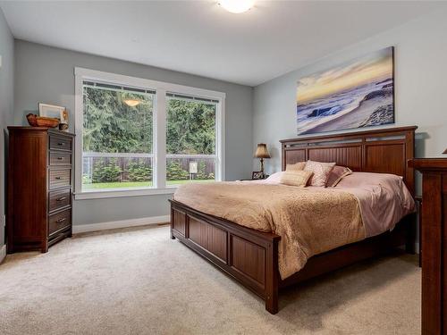 125 Allview Lane, Bowser, BC - Indoor Photo Showing Bedroom