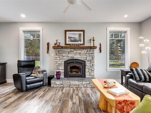 125 Allview Lane, Bowser, BC - Indoor Photo Showing Living Room With Fireplace