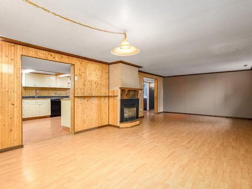11901 Kalamalka Road, Coldstream, BC - Indoor Photo Showing Other Room With Fireplace