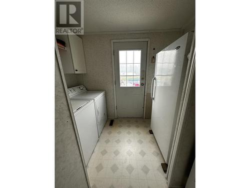 51 5701 Airport Drive, Fort Nelson, BC - Indoor Photo Showing Laundry Room