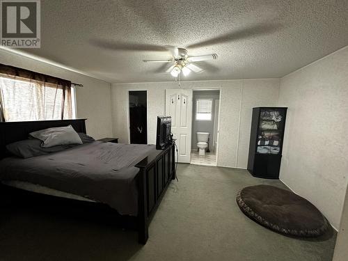 51 5701 Airport Drive, Fort Nelson, BC - Indoor Photo Showing Bedroom