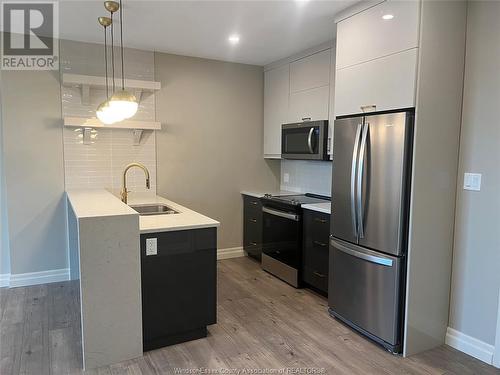 531 Pelissier Street Unit# 405, Windsor, ON - Indoor Photo Showing Kitchen With Stainless Steel Kitchen